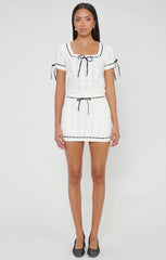 Sim Top ~ Ivory Knit With Black Trim
