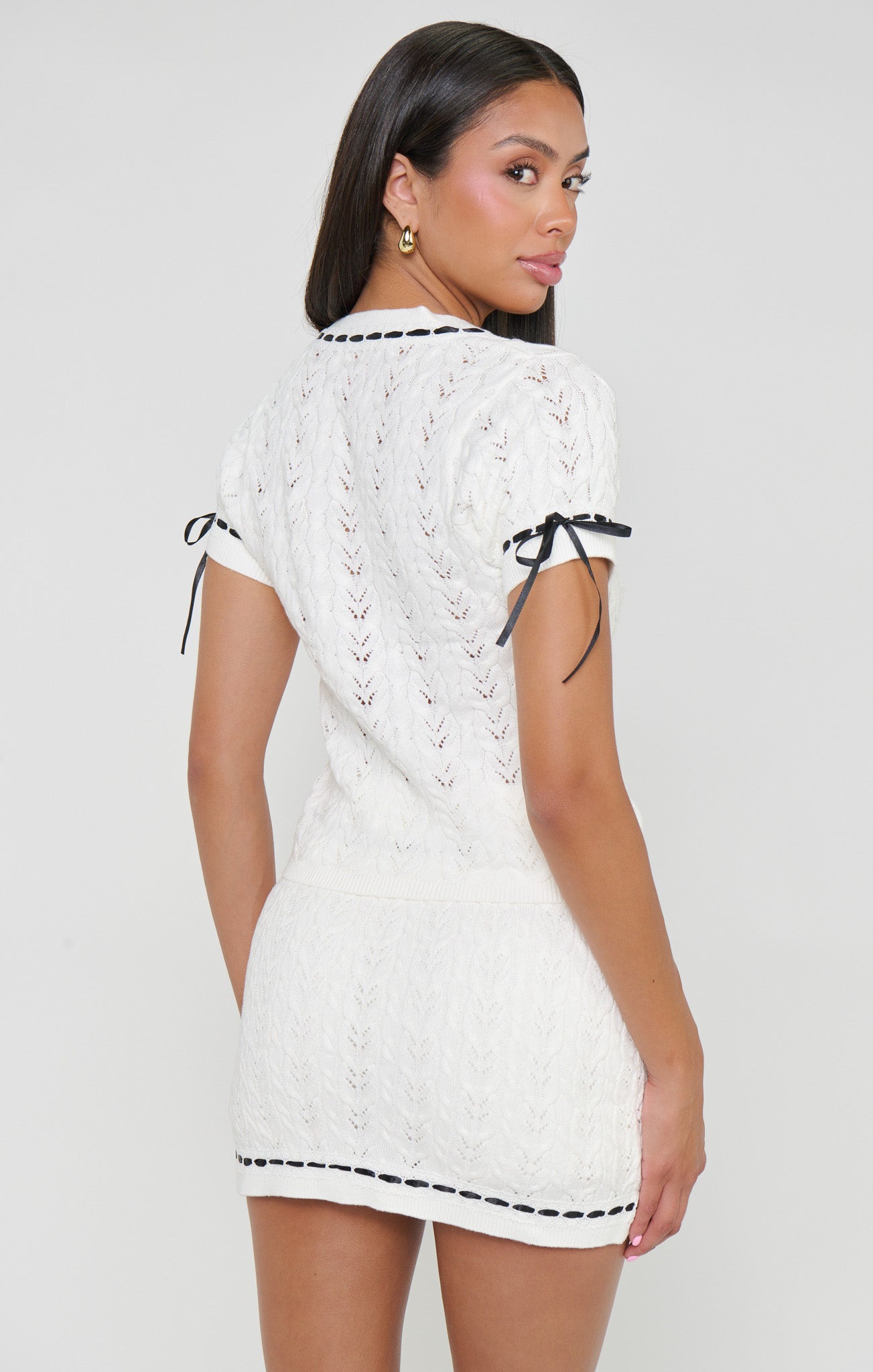 Sim Top ~ Ivory Knit With Black Trim