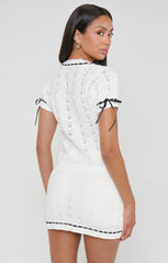 Sim Top ~ Ivory Knit With Black Trim